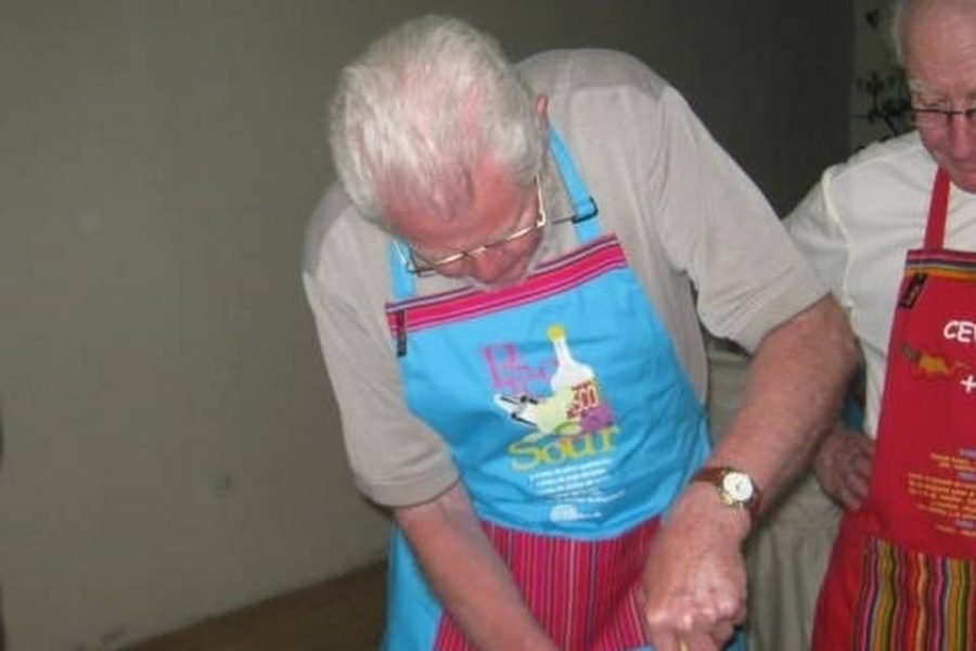 Here in our cooking class tourist learning how to prepare ceviche national dish.